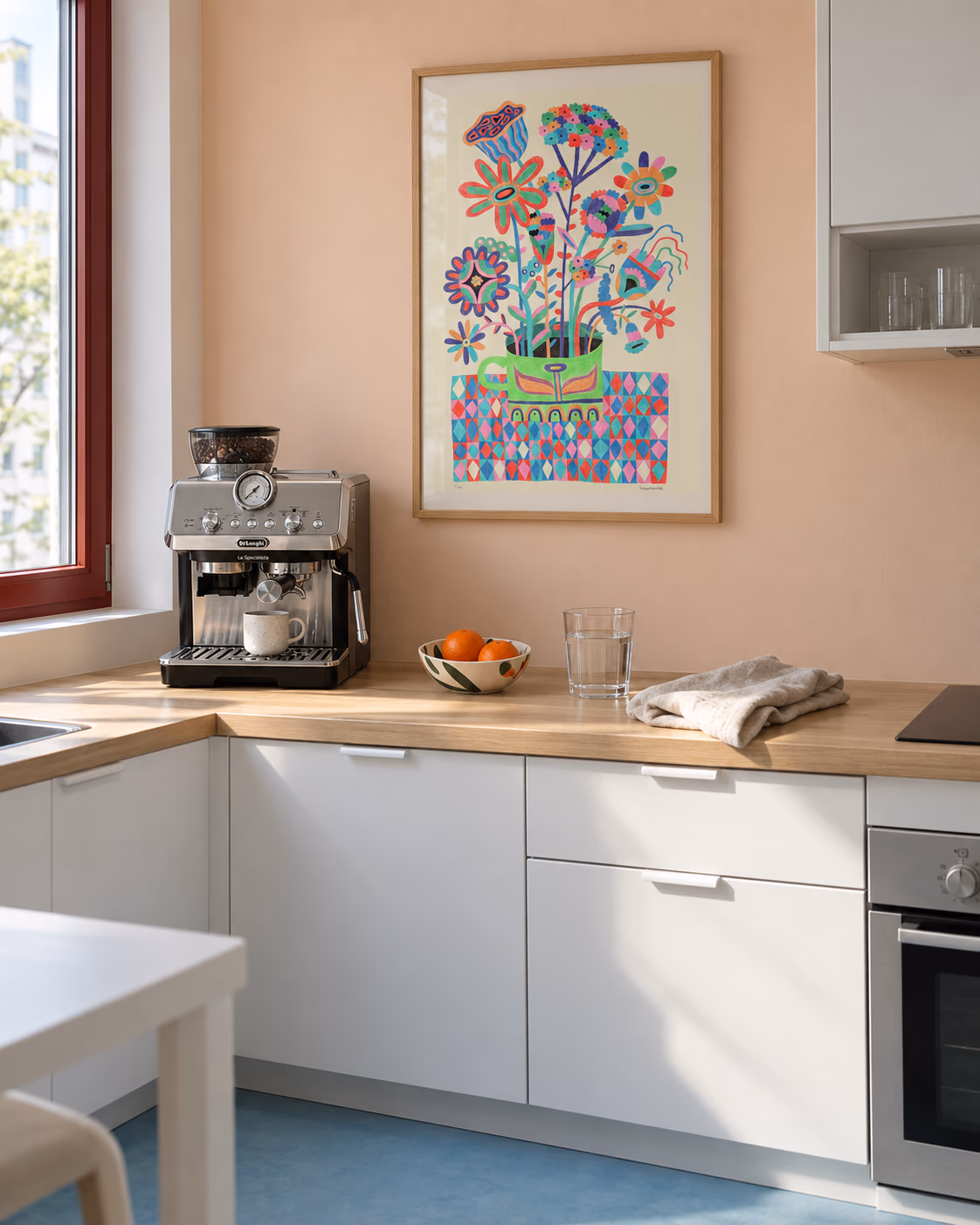 Trysilkaffe by Ingunn Dybendal framed above a kitchen coffee counter