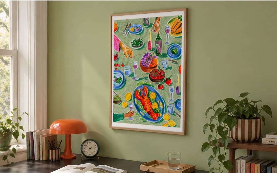 Hummer og Vin by Sia Siamos, 50 × 70 cm, framed on a green wall above a desk in a home office