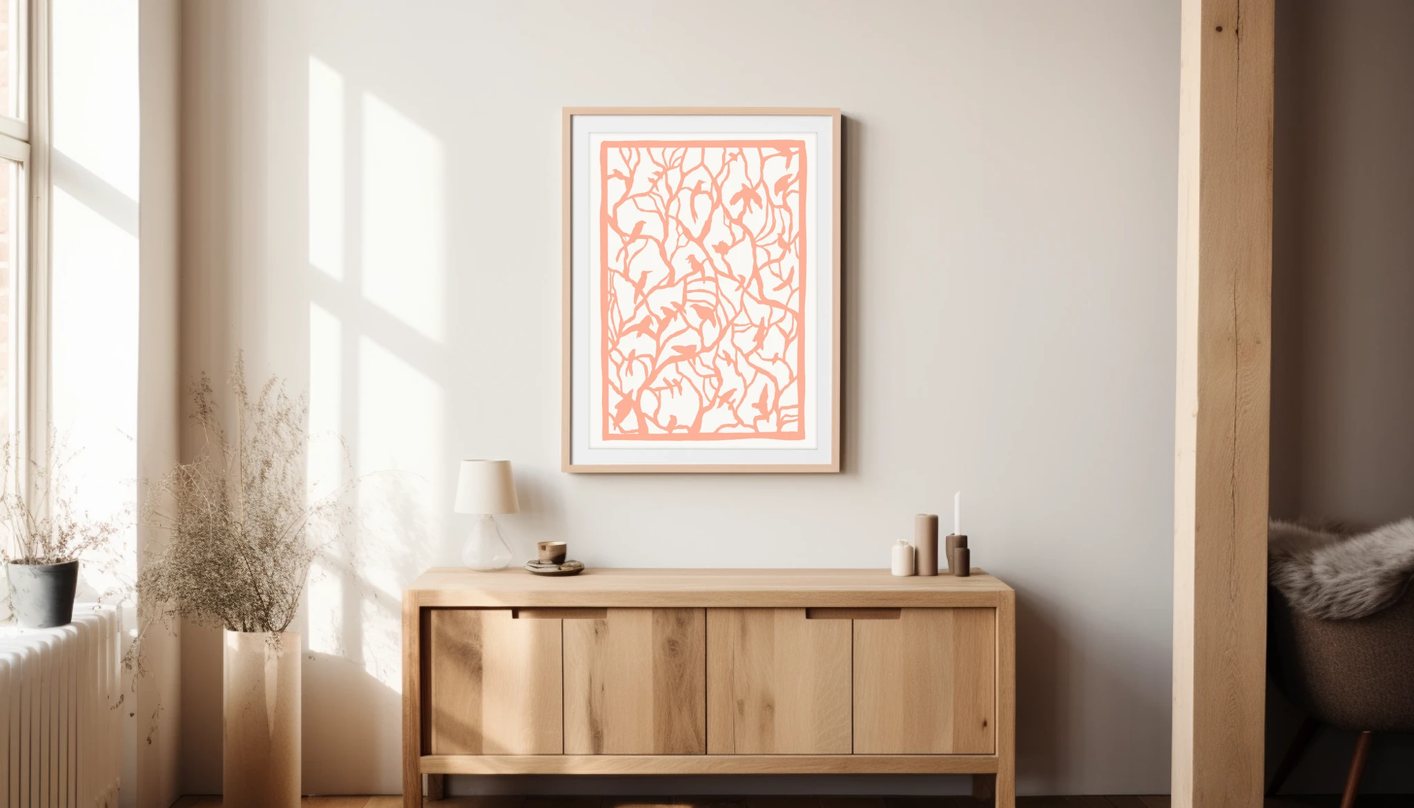 A framed Scandinavian art print in a light Nordic interior